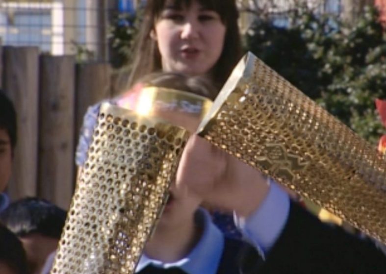 Torch Burns Gold for Olympics 2012 – great Games Olympics - meeting of flames