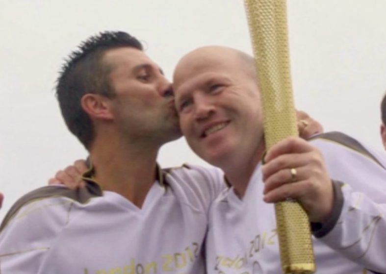 Olympic Torch Crosses Irish Border – embrace and kiss Olympic Torch - kiss from north to south