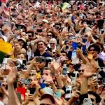 crowd watching first pray by new Pope