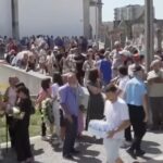 large crowd arrive for funeral