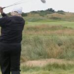 first swing on new golf course