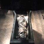 mummified in a coffin