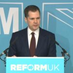 Robert Jenrick addressing media as Rreform UK member