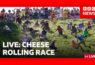 LIVE: Cheese rolling races well under way in baking heat