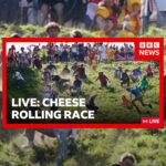LIVE: Cheese rolling races well under way in baking heat