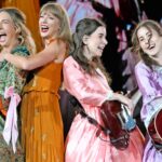 Swift performs with the Haim sisters