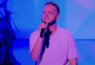 The Voice: Aaron James winner with judge Kelly Rowland